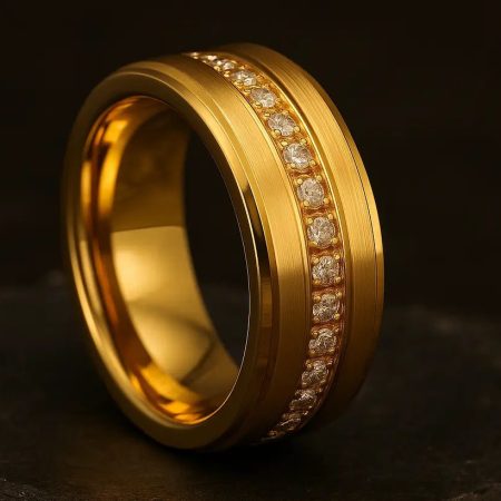 Gold ring with diamond accents on a dark background